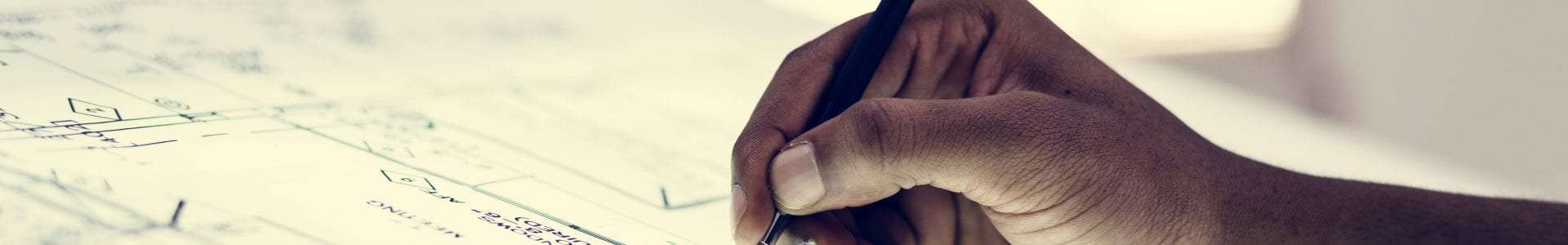 Close up of hands working on paperwork